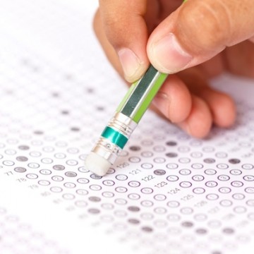 close up of hand and scantron